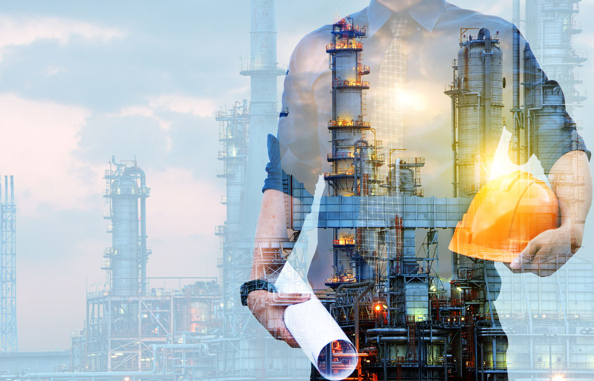 Double,Exposure,Of,Engineer,With,Safety,Helmet,With,Oil,Refinery