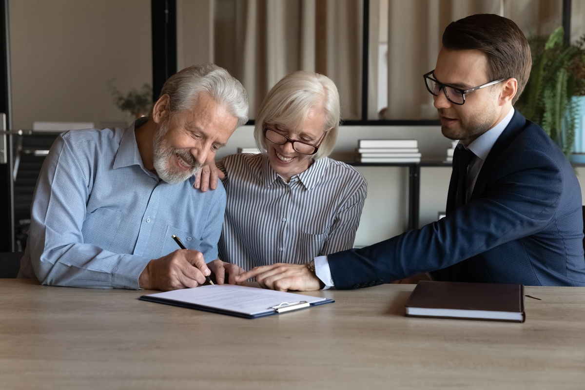 Closing,Deal.,Happy,Satisfied,Husband,Wife,Retirees,Put,Own,Signatures